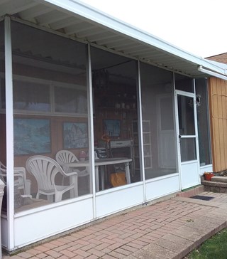 Ace Handyman Services of Lincoln Way replaced the screening on a screened in porch before