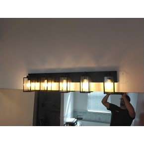 Ace Handyman Services of Lincoln Way replaced a bathroom light fixture and drywall patching, painting