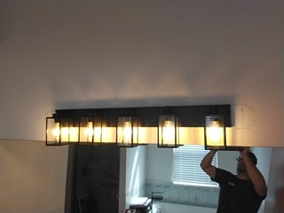 Ace Handyman Services of Lincoln Way replaced a bathroom light after
