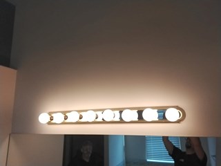 Ace Handyman Services of Lincoln Way replaced a bathroom light before