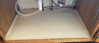 Ace Handyman Services of Lincoln Way repaired a sink base after water damage after