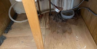 Ace Handyman Services of Lincoln Way repaired a sink base after water damage before