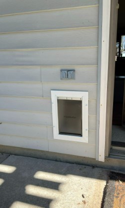 Fort Wayne Ace Handyman Services pet door install exterior after