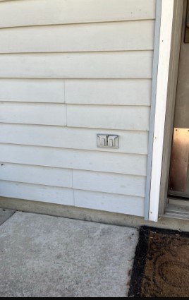 Fort Wayne Ace Handyman Services pet door install exterior before