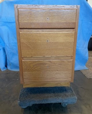 Sand, paint, and add hardware to kitchen cabinet in Cedar Rapids, IA