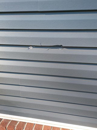 Siding Repair/Replacement Before in Bowling Green, KY