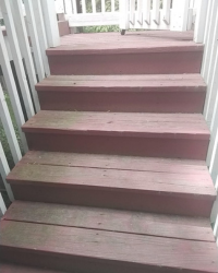 Power washing a staircase in Ellicott City, MD before