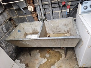 Before- Replacing utility sink in Silver Spring, MD- Ace Handyman Services Laurel