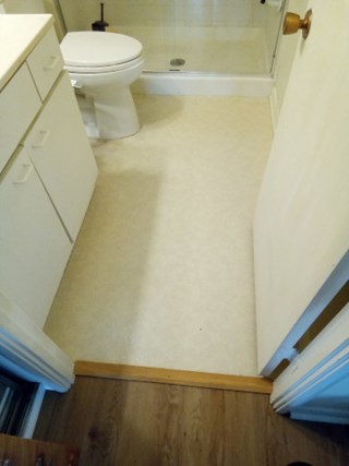 Before- Replace flooring in bathroom in Silver Spring, MD- Ace Handyman Services Laurel