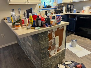 Before- Replace and paint paneling around kitchen island- Ace Handyman Services Laurel