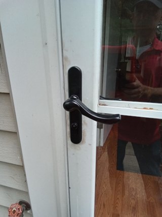 After- Storm door handle replacement in Crofton, MD- Ace Handyman Services Laurel