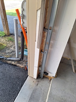 Before- Garage door trim repair in Hanover, MD- Ace Handyman Services Laurel