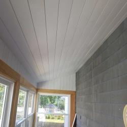 Added insulation and beadboard paneling to porch ceiling in Arlington