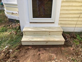 Simple rebuild of steps using pressure treated lumber in Billerica