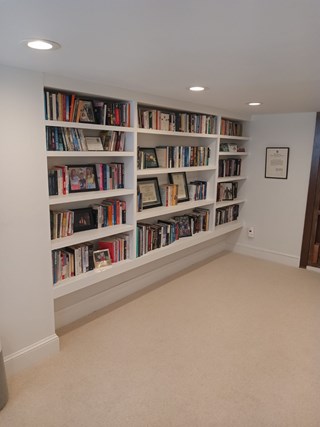 AHS Craftsmen custom-built this shelving unit to the customer's specifications. Storage problem solved!