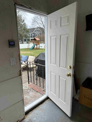 Ace Handyman Services Craftsman installed a new fiberglass entry door with new lock set and deadbolt for added security.