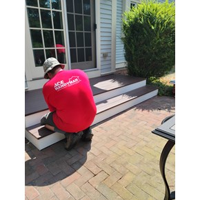AHS Craftsman working on exterior stairs