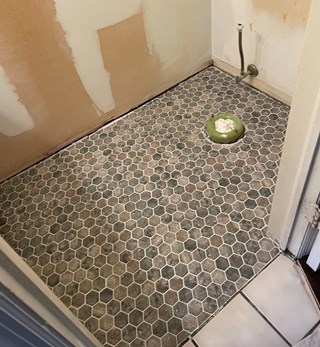 After: Shower tiling