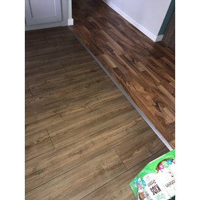 Install new flooring transition strip in Caledonia Michigan