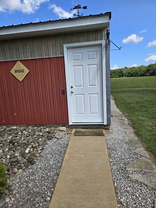 New pole barn door freshens up the building.