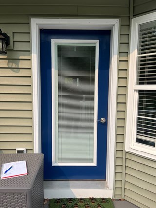 Storm Door Install Before in Traverse City