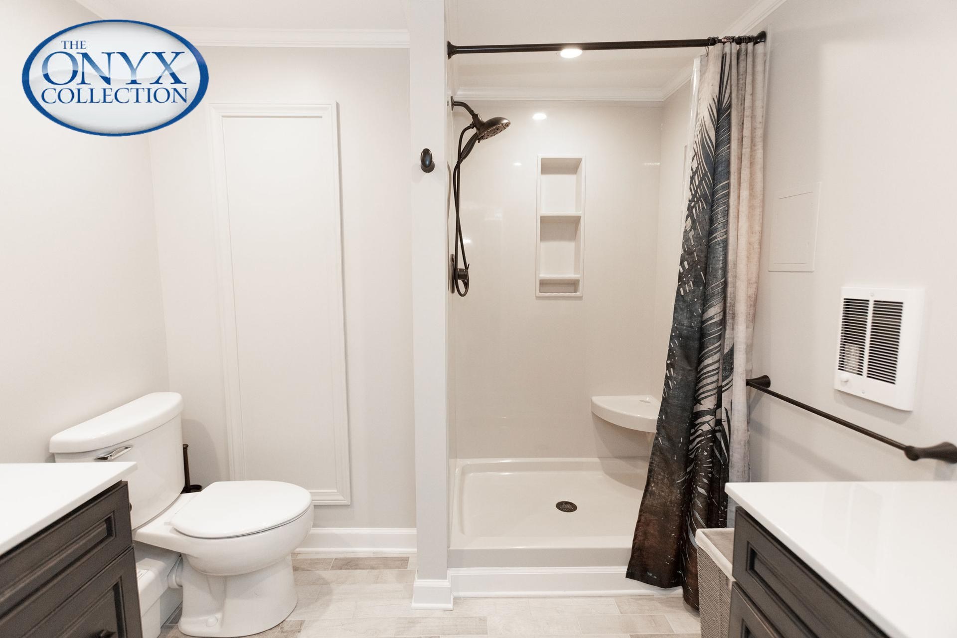 A couple embraces and looks at a life-sized drawn rendering of their bathroom as it transforms into a real-life completed project. A couple embraces and looks at a life-sized drawn rendering of their bathroom as it transforms into a real-life completed project.