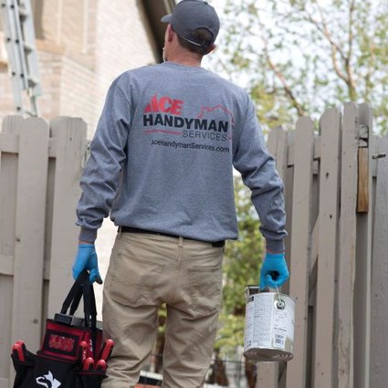 Handyman repairing fence in Minnetonka, MN