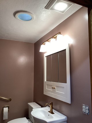 New vanity, mirror and toilet for a bathroom remodel in Coon Rapids, MN