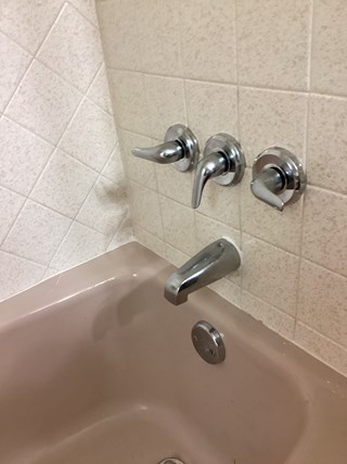 New shower and bathtub faucet and handles 