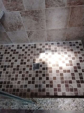 Cleaned and Regrouted Shower Floor