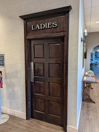Hotel Restroom Door Refinished