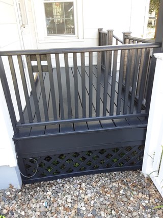Customer's porch railing and trellis after repainting in Niskayuna, NY