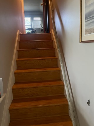 Clifton Park customer's handrail that fell off the wall after stopping a fall down the stairs.