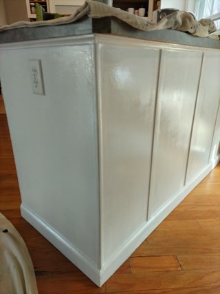 After Handyman Pete repaired and improved the same island in the customer's home in Latham.