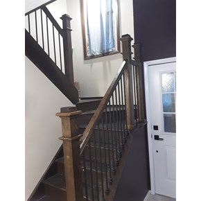 Stair rails installed along a stairwell.