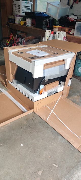 Weber Genesis Grill when it arrived at the customer's home in Saratoga Springs.