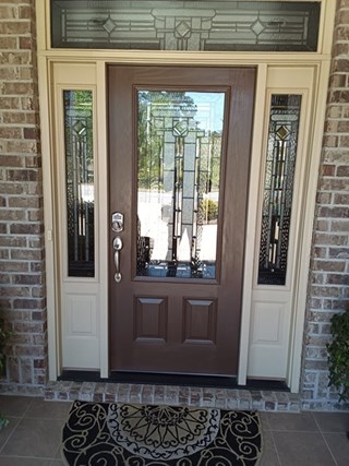 Exterior door paint after in Leland