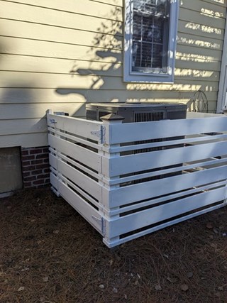 HVAC fence surround after repairs in Southport, NC