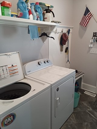 Laundry room refresh before in Southport, NC