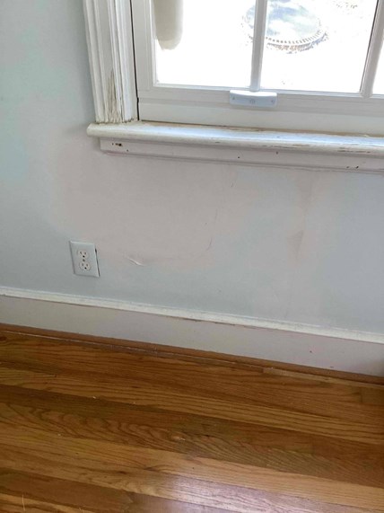 Smoothly repaired and painted plaster wall in an older Chapel Hill, NC home by Ace Handyman Services Durham and Chapel Hill