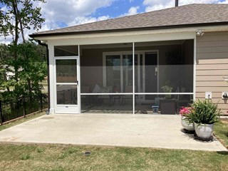 Screened in porch before a retractable awning was installed. 