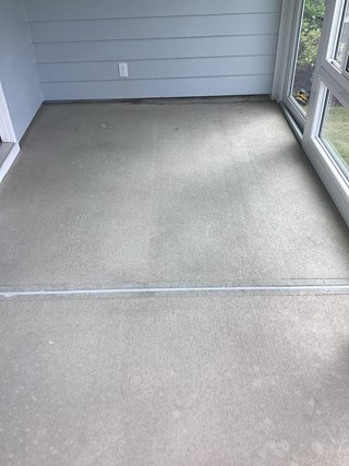  Concrete floor in a porch area prior to floor installation. 