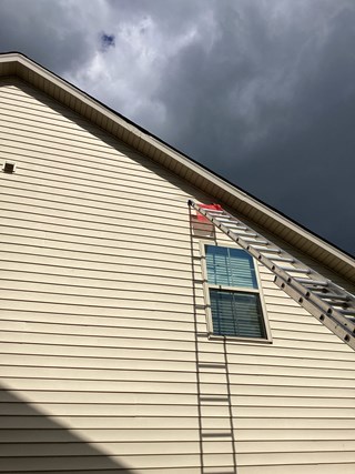 Section of the wall after repairs have been made to the fascia. 