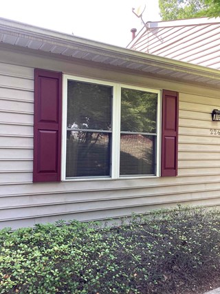 Brand new plastic shutters have been added to the house.  