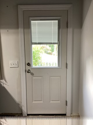 Exterior door before doggy door installation. 