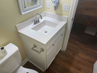 Bathroom vanity after the backsplash has been completed. 