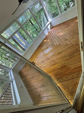 Image shows the same deck after it has been stained.