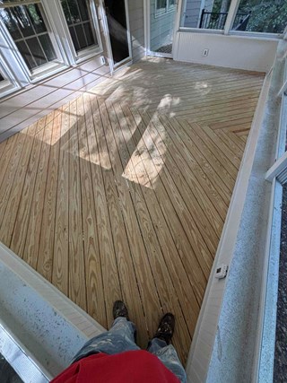 A wooden deck before staining.