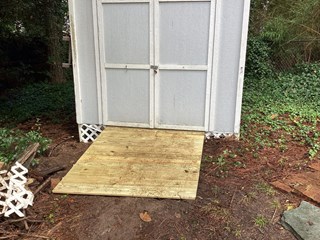 Newly built ramp, made of fresh, clean wood that has replaced the old one.