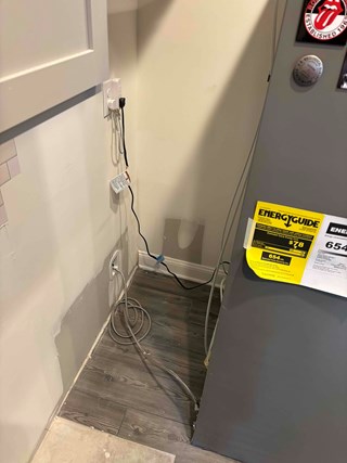 Water heater closet with a freshly repaired drywall. 
